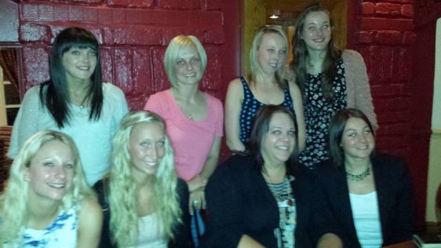 Maxine and coaches at a farewell dinner where Maxine officially handed over to Ceri